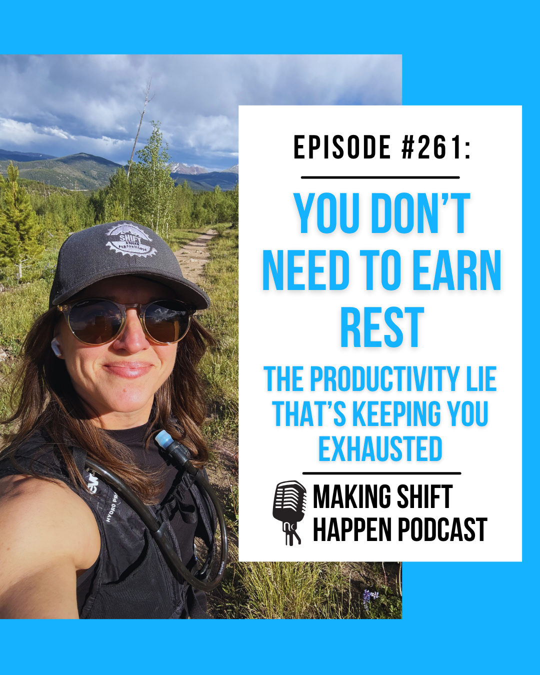 Jen is wearing a black tank top and a black hydration vest along with her brown sunglasses and Shift Human Performance baseball hat that is blue and grey. She is smiling and looking into the camera while she is running on a mountain trail with some snow-capped Colorado mountains off into the distance.